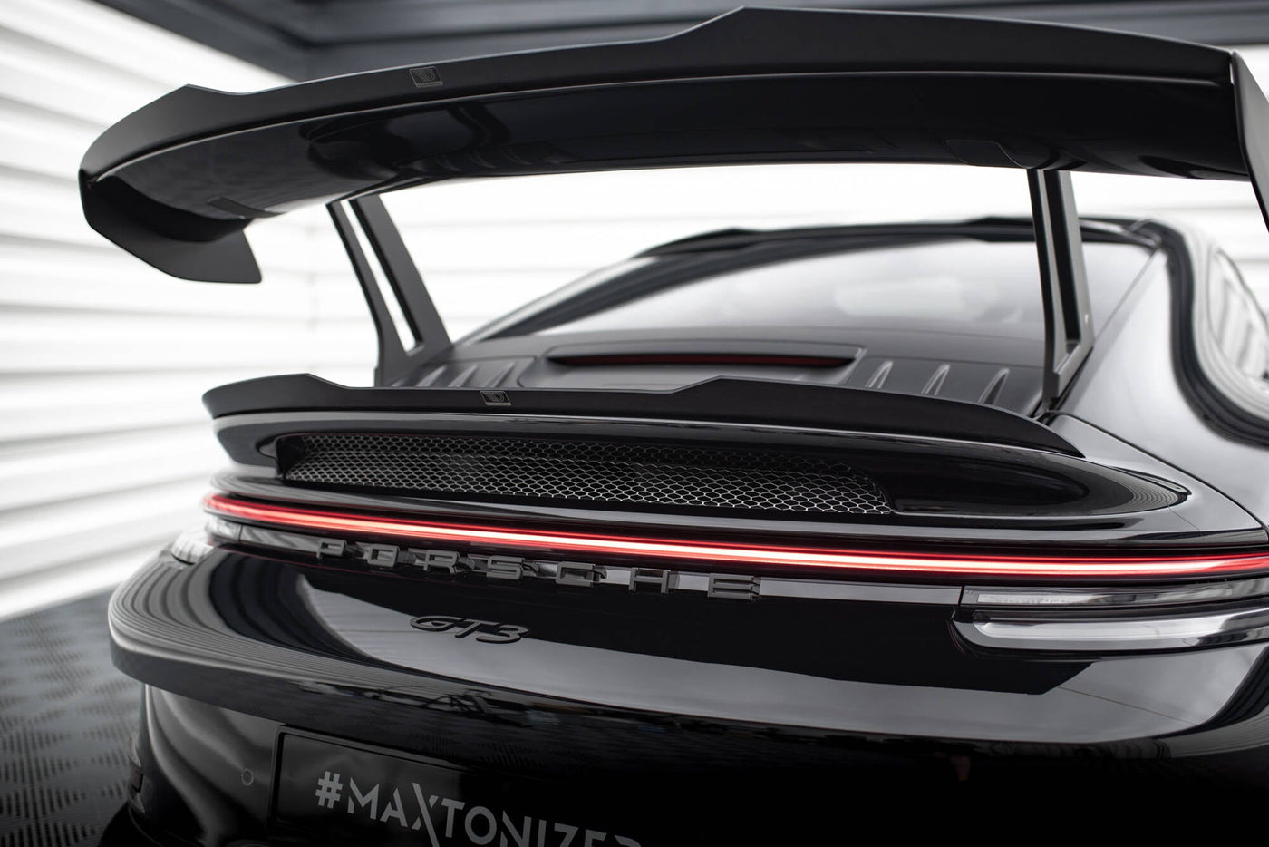 Porsche 911 992 GT3 lower spoiler cap, rear view