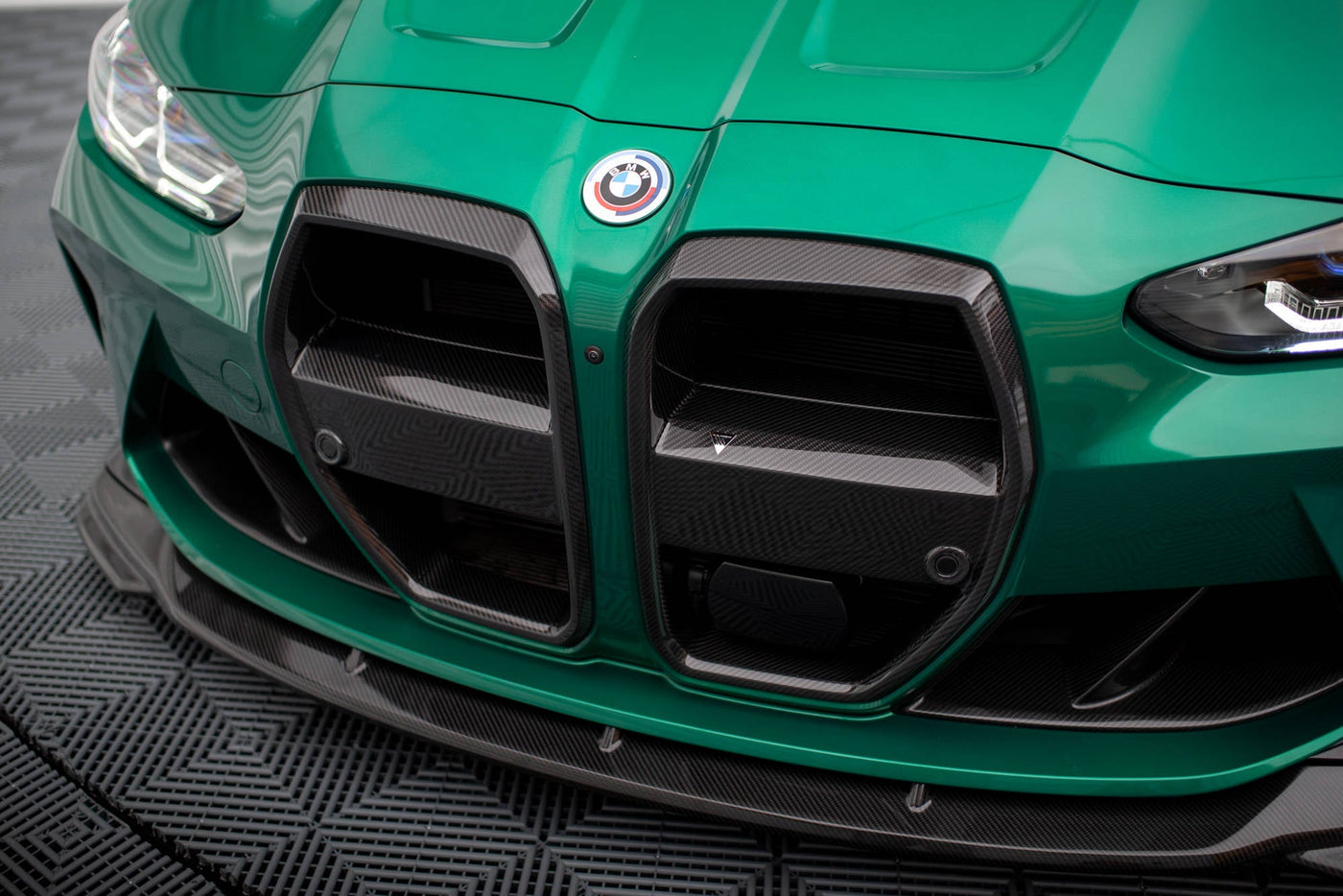 BMW M3 (G80) / M4 (G82) Carbon Fiber Front Grille — vehicle view