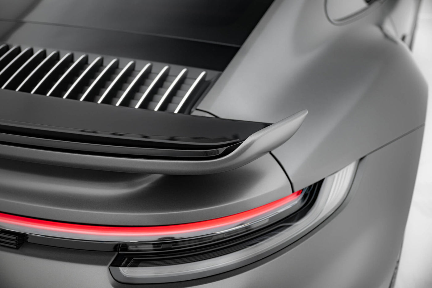 Porsche 911 (992) Turbo S Sport Package Spoiler Cap — vehicle view