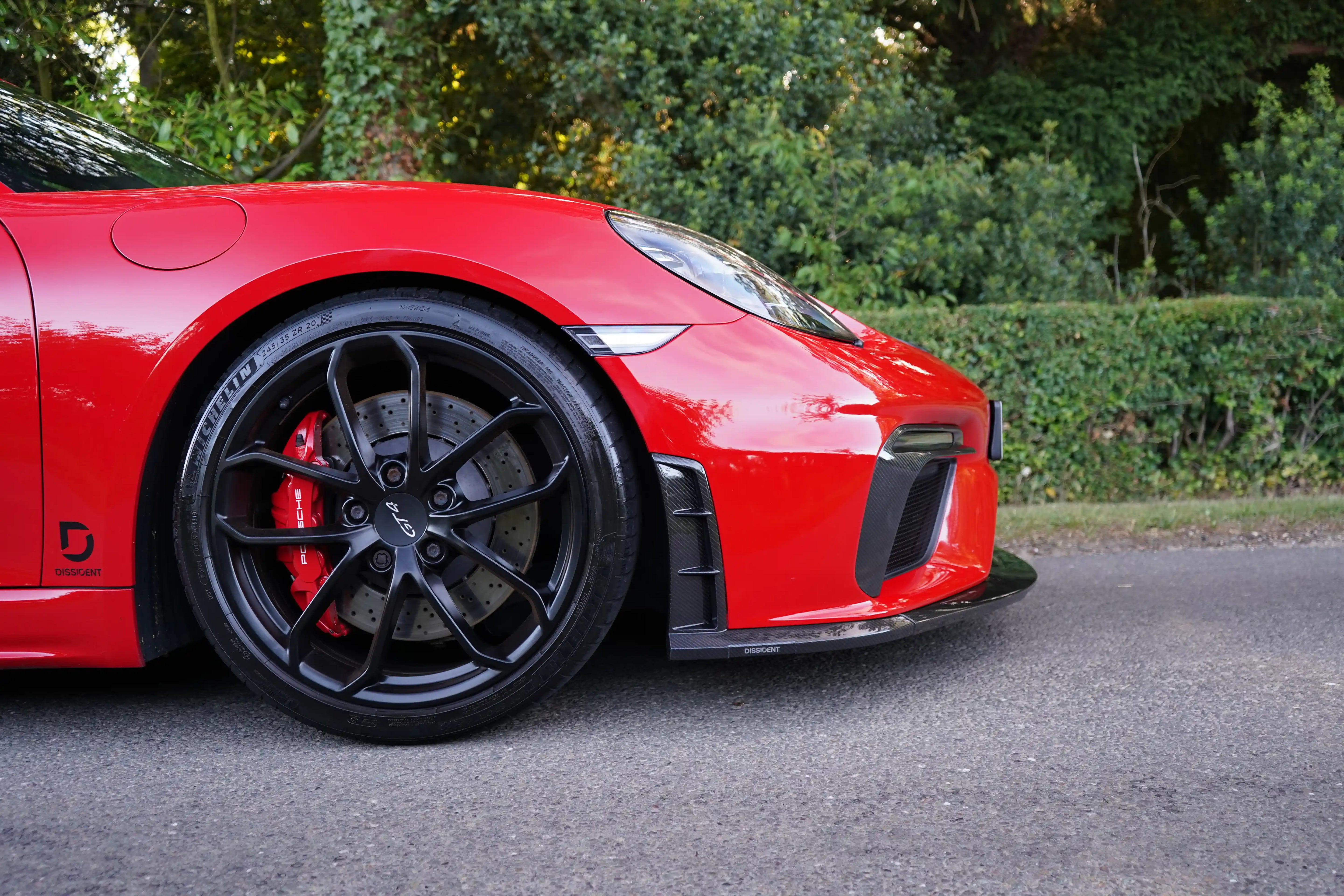 718 GT4 Front Splitter End / Vent Pair Visual Gloss  Carbon Laquered