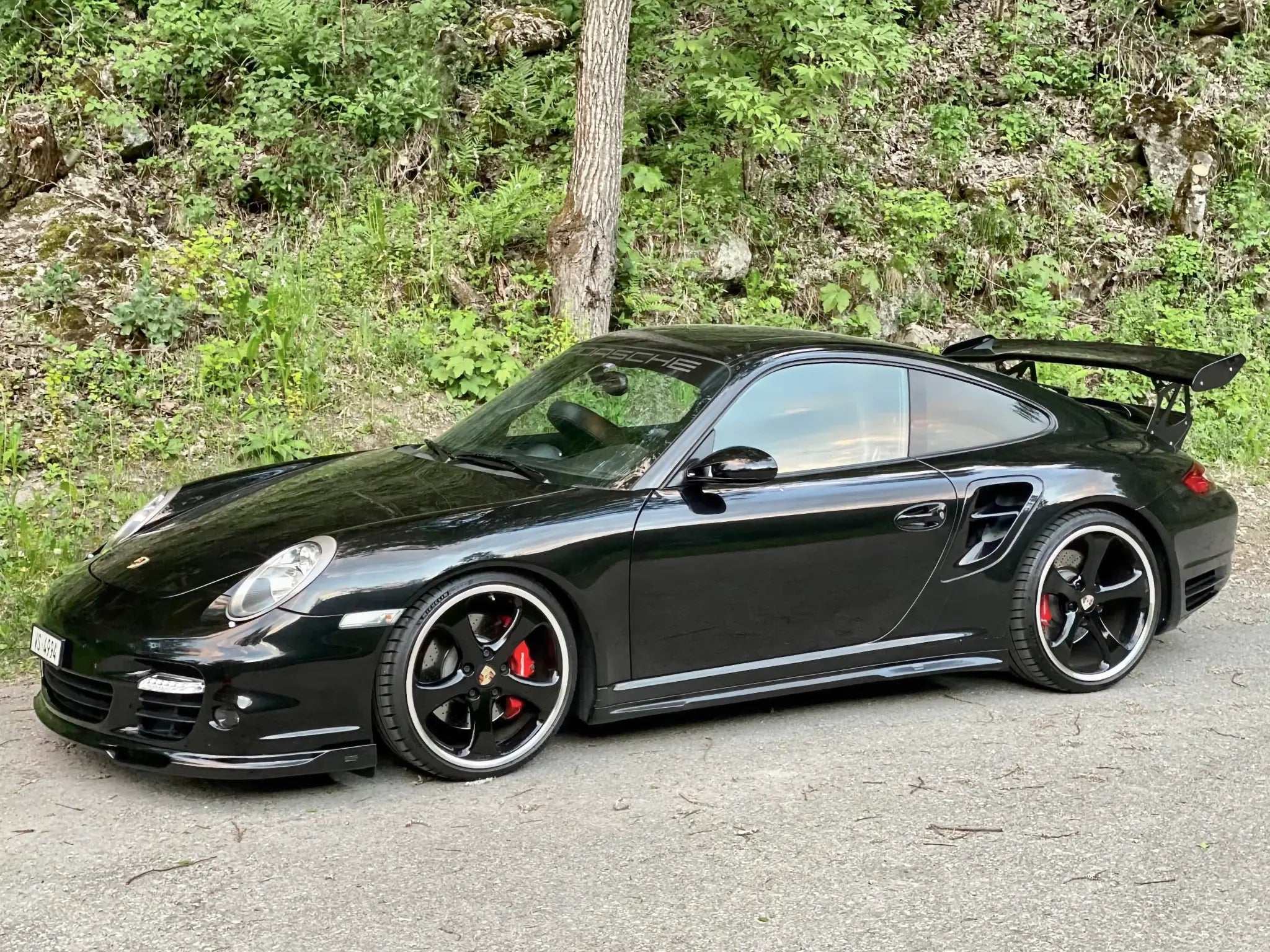 Moshammer side skirts on Porsche 997 Turbo wide body — side view