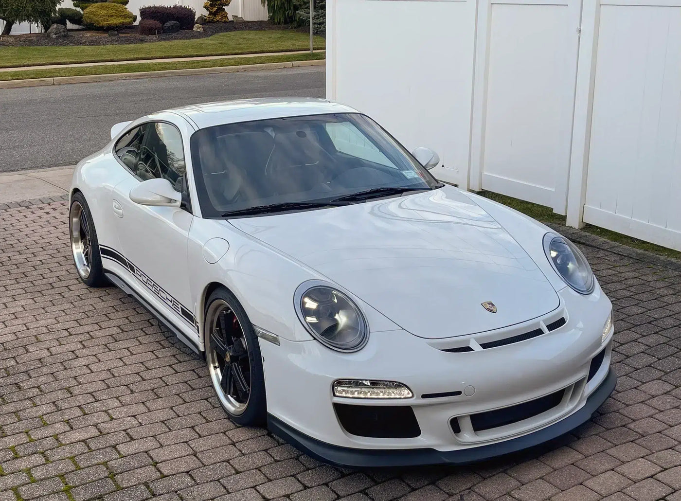 Moshammer 997 wide body side skirts on Porsche 997 — side profile with ducktail
