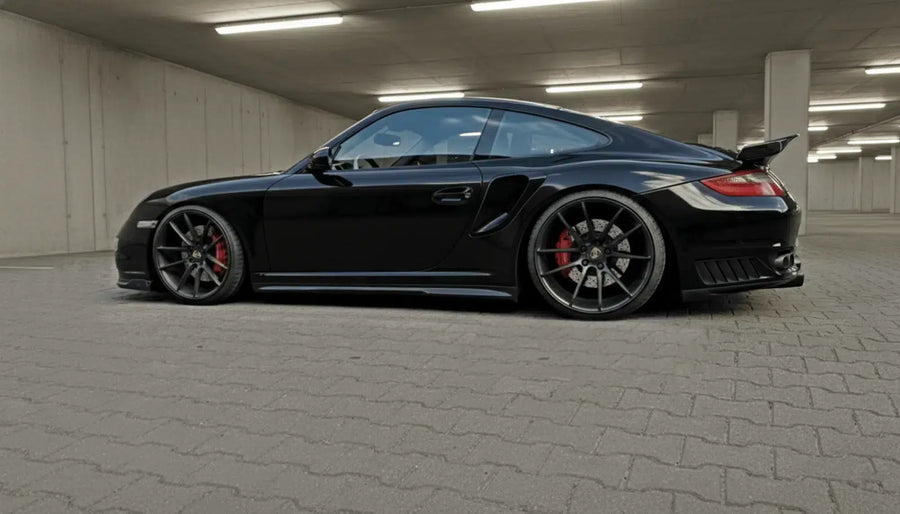 Porsche 997 Turbo with Moshammer rear wing spoiler — side rear view