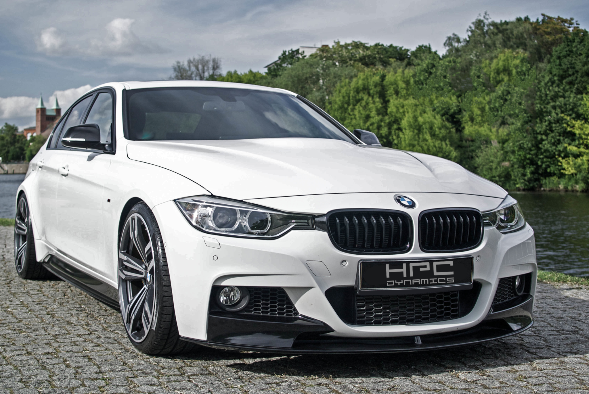 BMW F30 with Moshammer vented front fenders and wide arches — side view