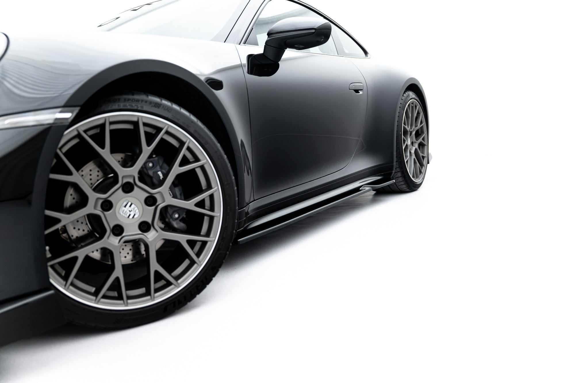 Porsche 911 (992) Carrera Sport Design Side Skirt Diffusers V1 — vehicle view