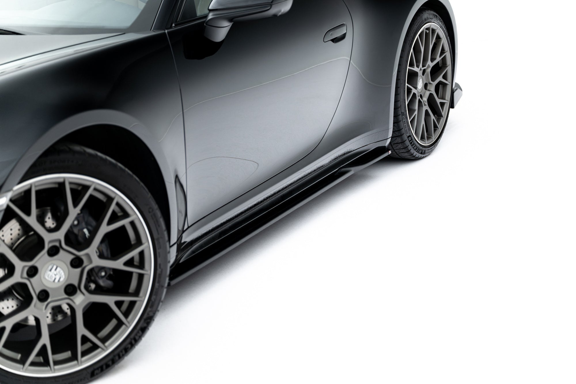 Porsche 911 (992) Carrera Sport Design Side Skirt Diffusers V1 — vehicle view
