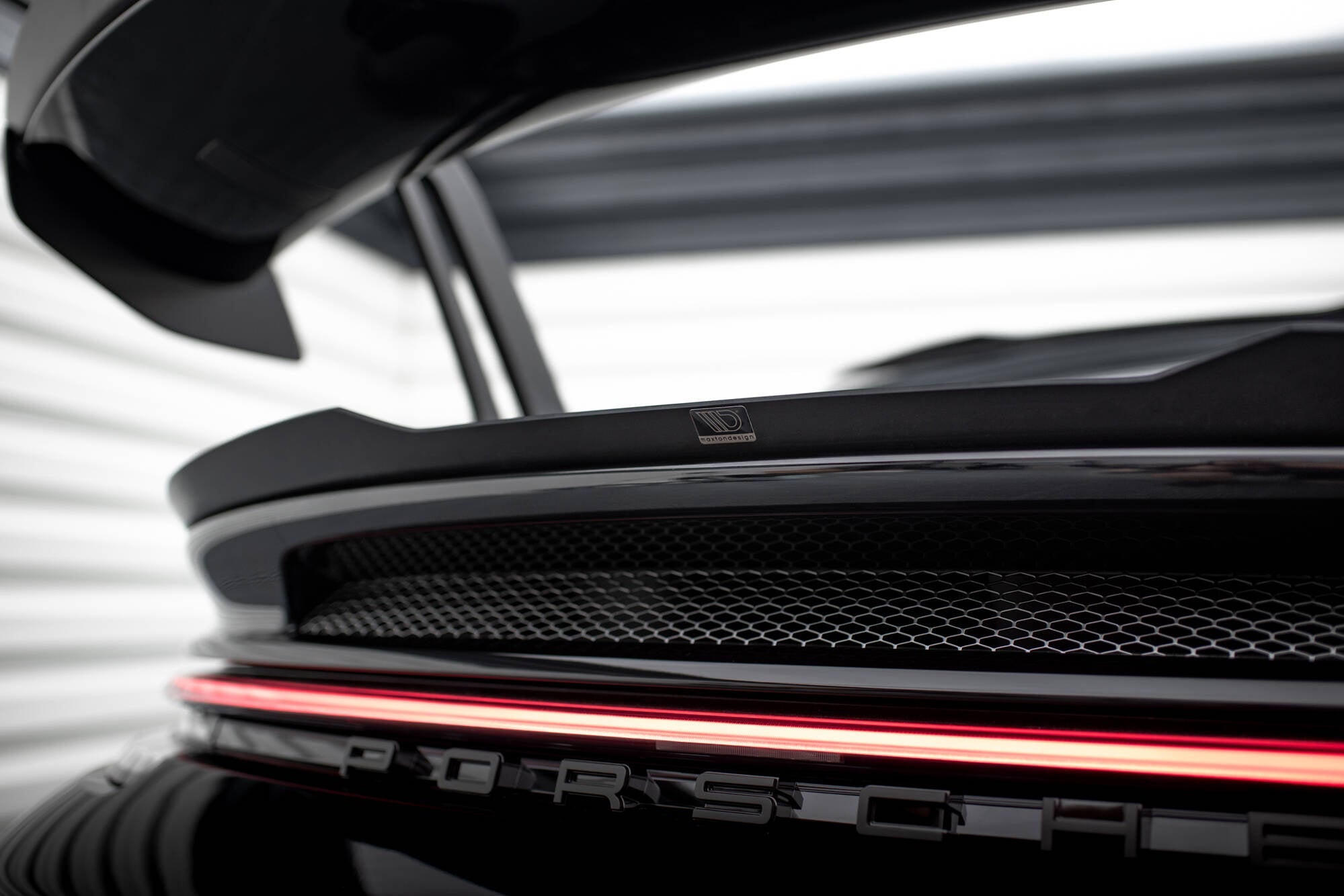 Porsche 911 992 GT3 lower spoiler cap, rear three-quarter