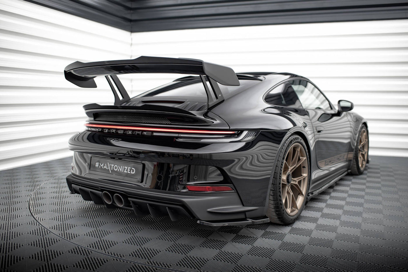 Porsche 911 992 GT3 lower spoiler cap, angled detail