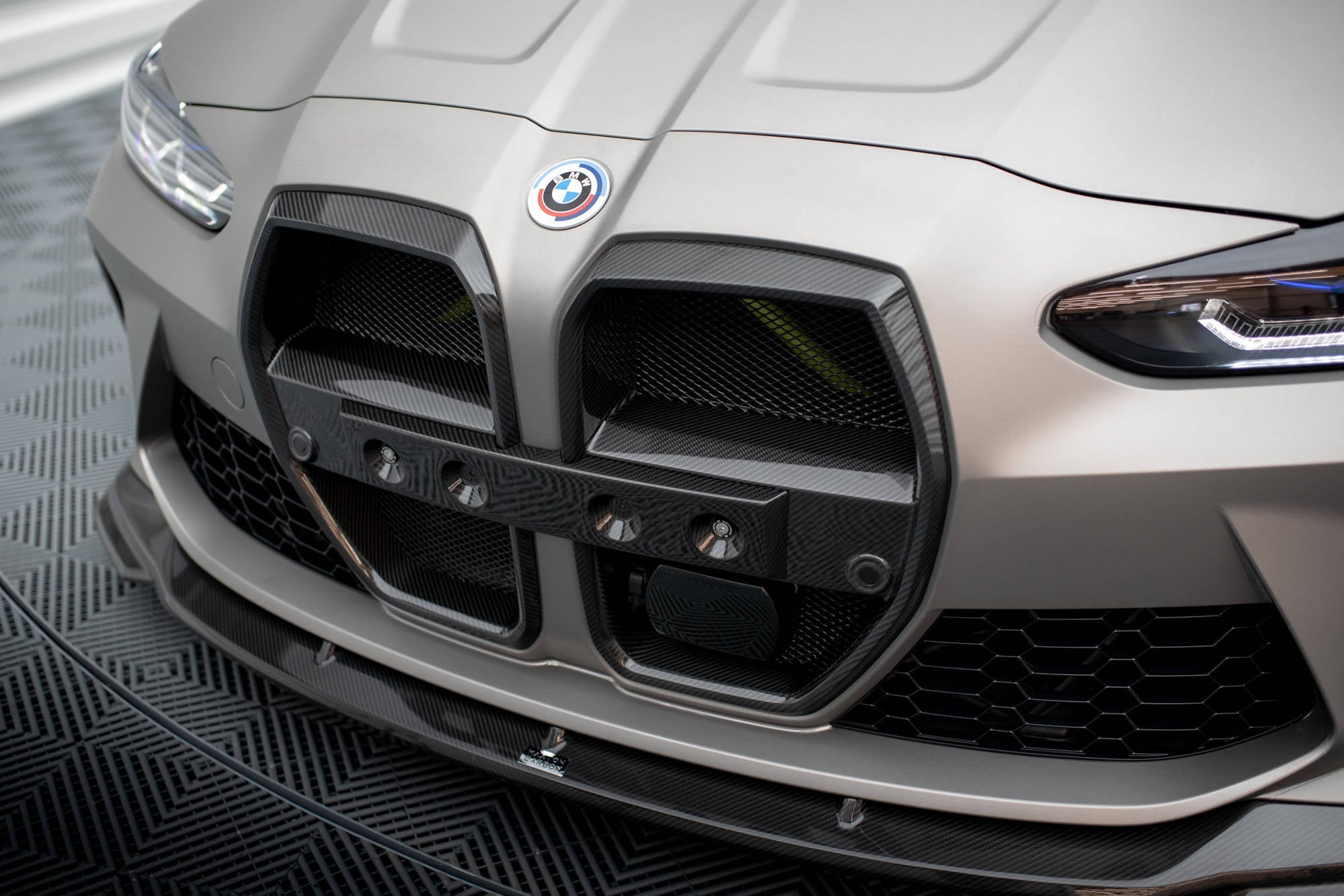 BMW M3 (G80) / M4 (G82) Carbon Fiber Front Grille — vehicle view