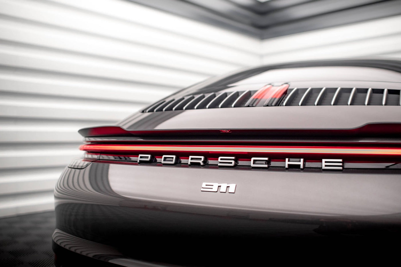 Porsche 911 (992) Carrera 4S Spoiler Cap — vehicle view