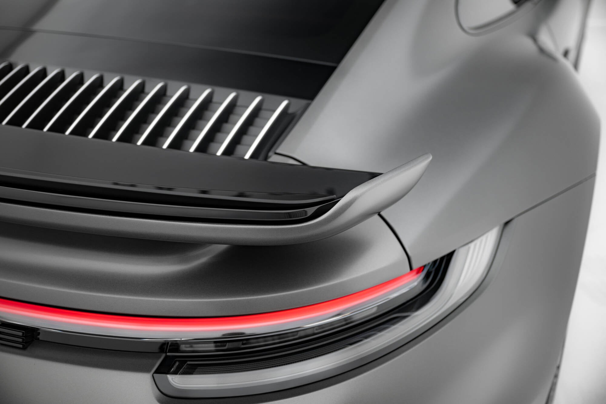 Porsche 911 (992) Turbo S Sport Package Spoiler Cap — vehicle view